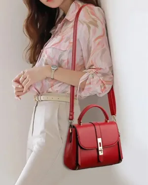 Hand & Crossbody Bag with Twist Lock.